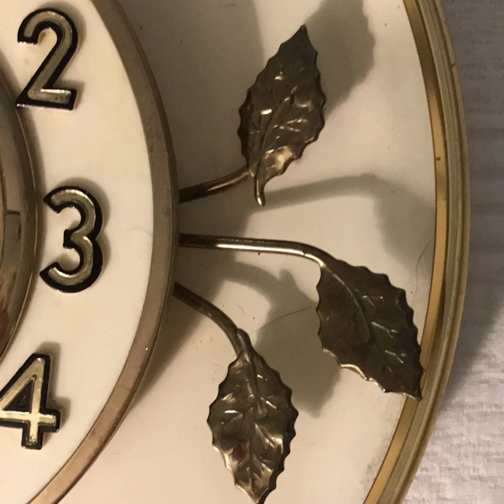 Vintage Mid Century United Ivory & Black with Gold Leaves Plug In Wall Clock